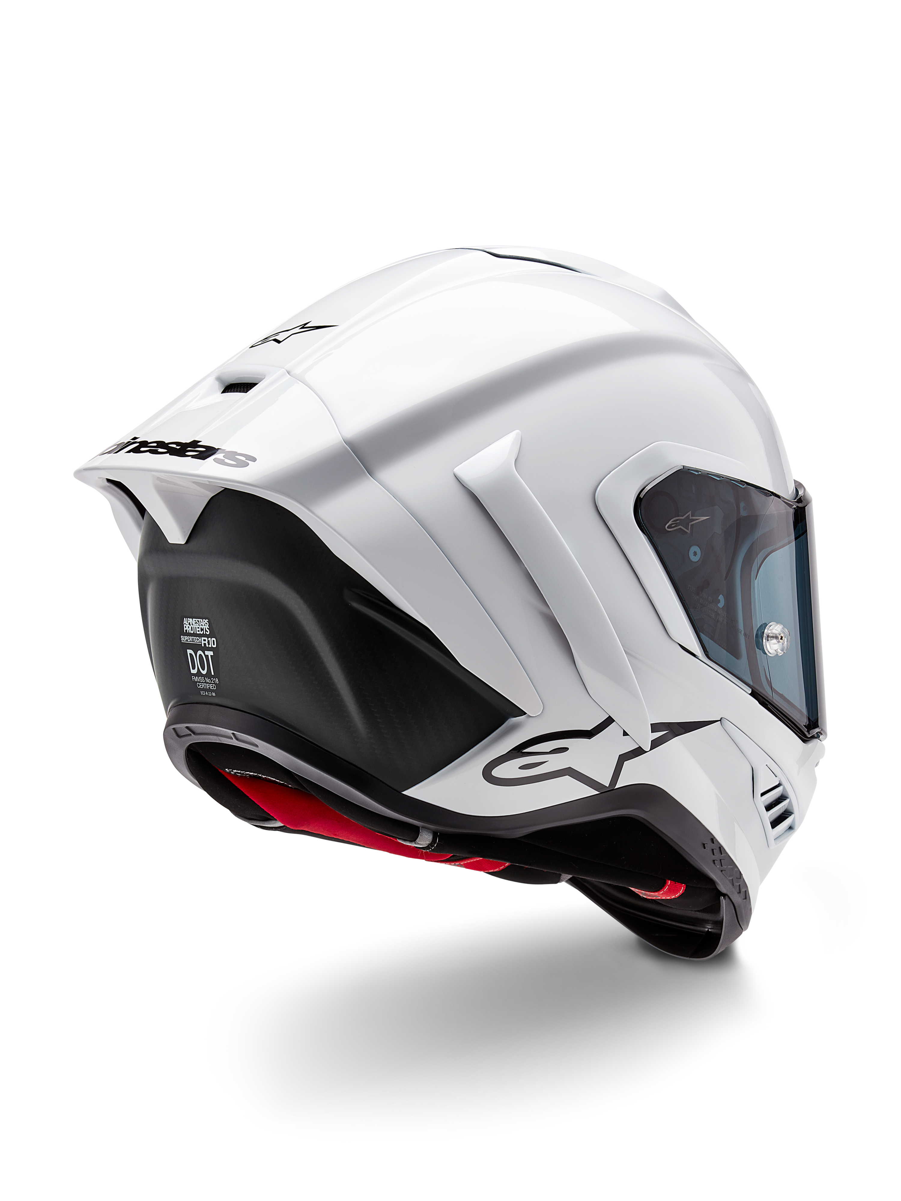 Casco Alpinestars Supertech R10 Solid, casco integrale racing da moto, Bianco Lucido e Nero Opaco, vista posteriore a tre quarti con spoiler aerodinamico, alette laterali e loghi neri