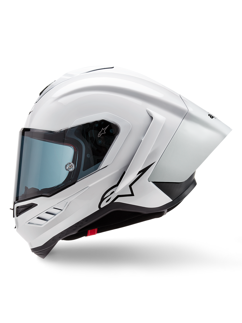 Casco Alpinestars Supertech R10 Solid, casco integrale da corsa, bianco lucido e nero opaco, vista laterale con spoiler aerodinamico integrato e visiera oscurata, con logo a stella Alpinestars nero