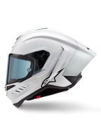 Casco Alpinestars Supertech R10 Solid, casco integrale da corsa, bianco lucido e nero opaco, vista laterale con spoiler aerodinamico integrato e visiera oscurata, con logo a stella Alpinestars nero