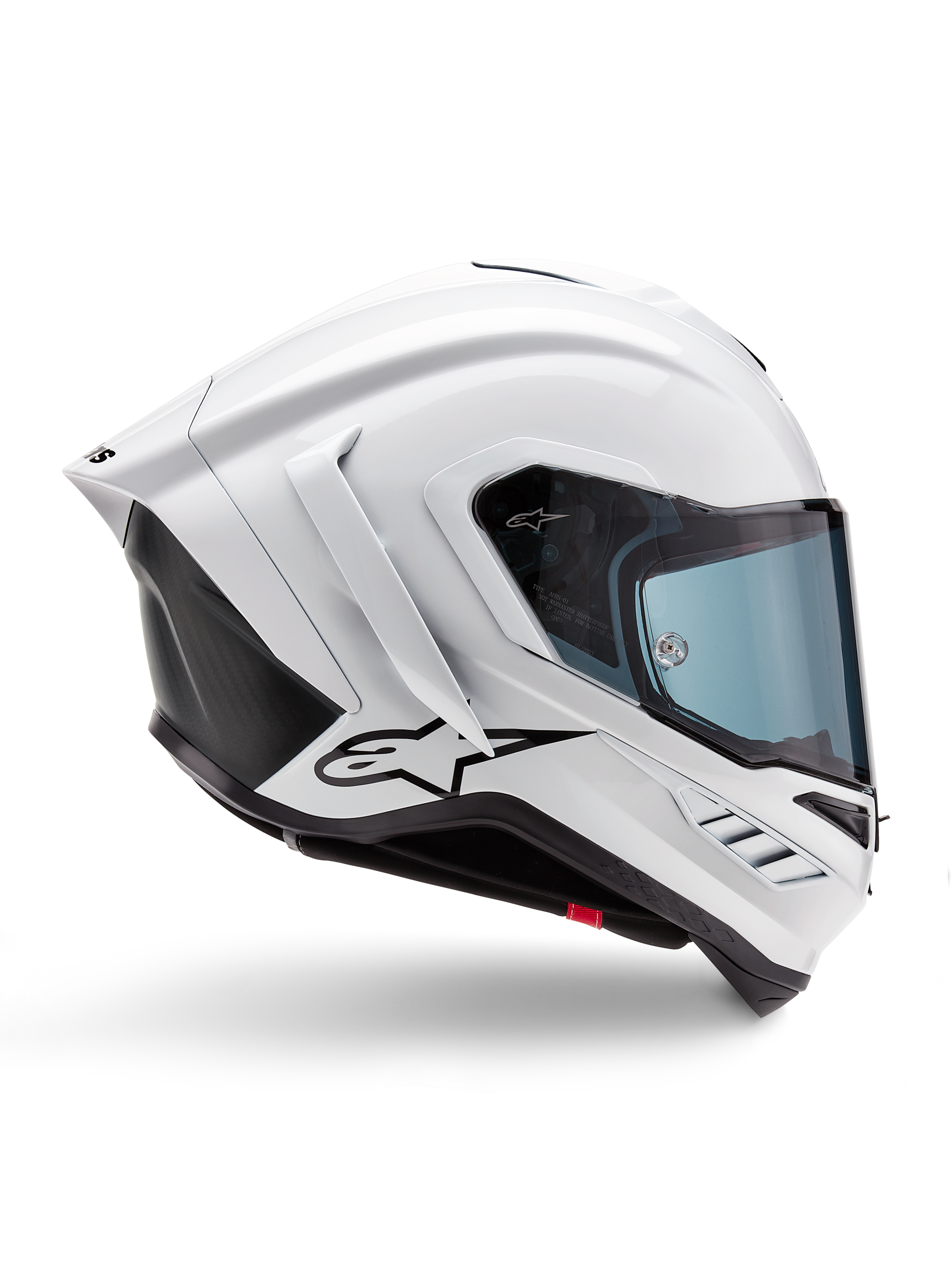Casco Alpinestars Supertech R10 Solid, casco da moto racing bianco lucido e nero opaco, vista laterale di profilo, design aerodinamico con alette posteriori e prese d'aria laterali, visiera con tinta blu, caratterizzato dal logo a stella Alpinestars nero sul lato