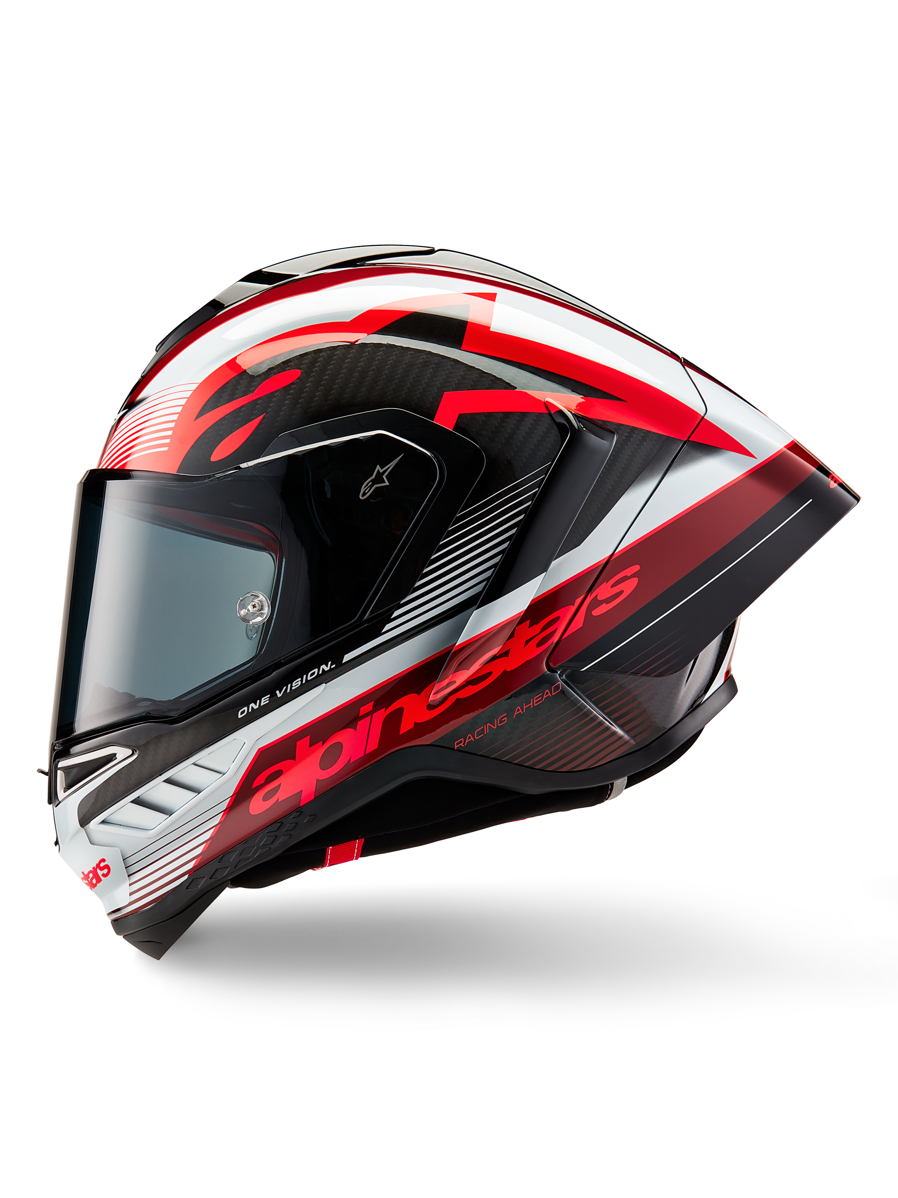 Casco Alpinestars Supertech R10 Team, casco integrale da moto racing, finitura lucida nero carbonio, rosso e bianco, profilo laterale con design aerodinamico, logo rosso con scritte 'One Vision' e 'Racing Ahead', elegante costruzione in fibra di carbonio per prestazioni professionali.