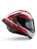 Casco Alpinestars Supertech R10 Team, casco da moto racing, carbonio nero con grafiche lucide rosse e bianche, profilo aerodinamico con visiera scura, dettagli in fibra di carbonio e logo rosso vivace, equipaggiamento racing ad alte prestazioni