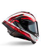 Casco Alpinestars Supertech R10 Team, casco da moto racing, carbonio nero con grafiche lucide rosse e bianche, profilo aerodinamico con visiera scura, dettagli in fibra di carbonio e logo rosso vivace, equipaggiamento racing ad alte prestazioni