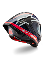 Casco Alpinestars Supertech R10 Team, casco professionale da competizione motociclistica, carbonio nero con dettagli rosso fluorescente e blu opaco, vista posteriore aerodinamica con spoiler integrato, branding Alpinestars in evidenza e trama della calotta in fibra di carbonio visibile.
