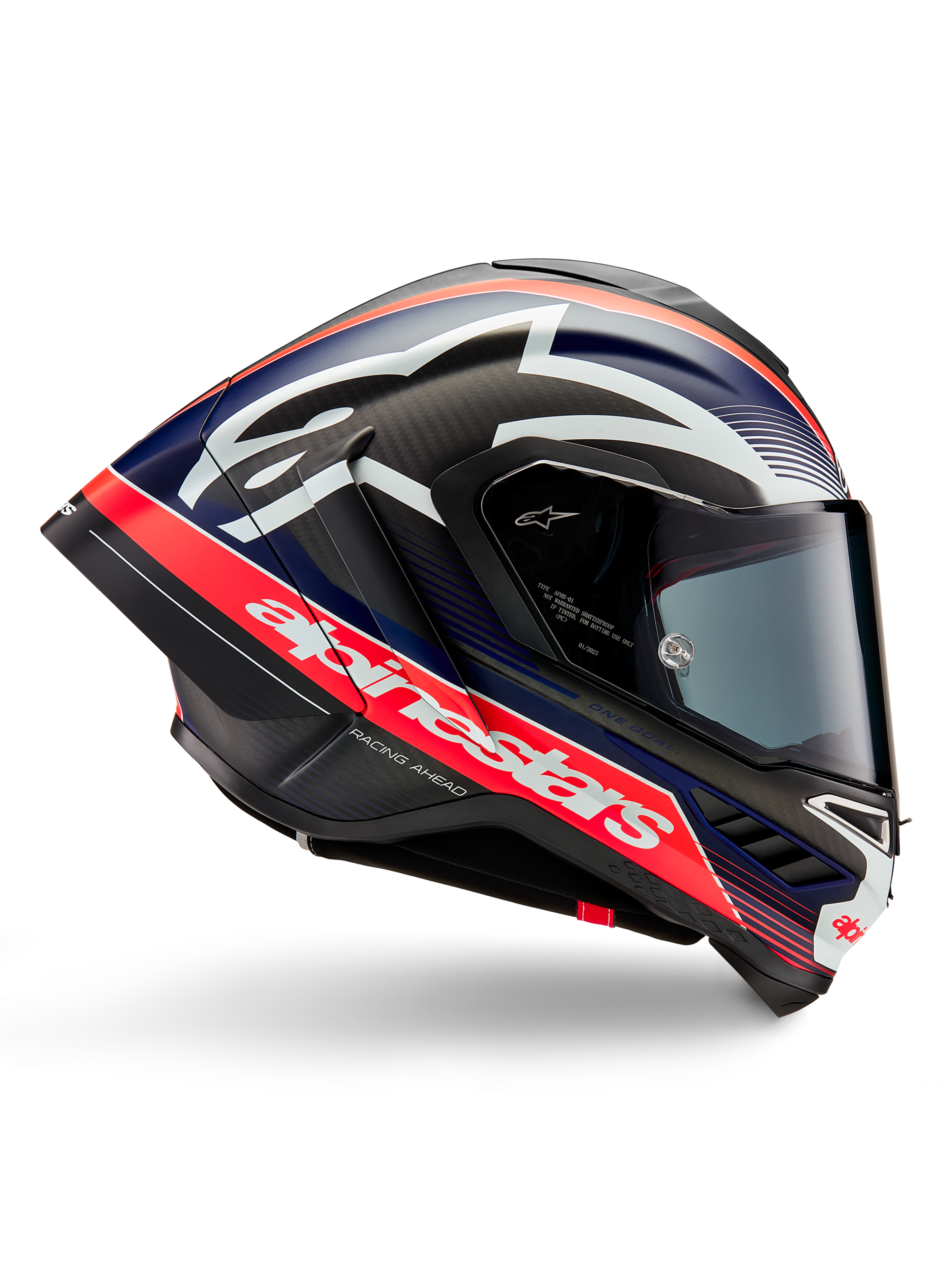Casco Alpinestars Supertech R10 Team, casco da moto racing, carbonio nero con accenti rosso fluo e blu opaco, grande logo Alpinestars bianco, design aerodinamico con spoiler integrati, visiera trasparente, trama in fibra di carbonio a vista, profilo racing elegante