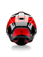 Casco Alpinestars Supertech R10 Element, vista posteriore, nero carbonio con accenti rosso brillante e bianco lucido, con spoiler posteriore aerodinamico, prese d'aria di scarico ed etichetta di certificazione DOT, design elegante di ispirazione racing con dettagli in fibra di carbonio