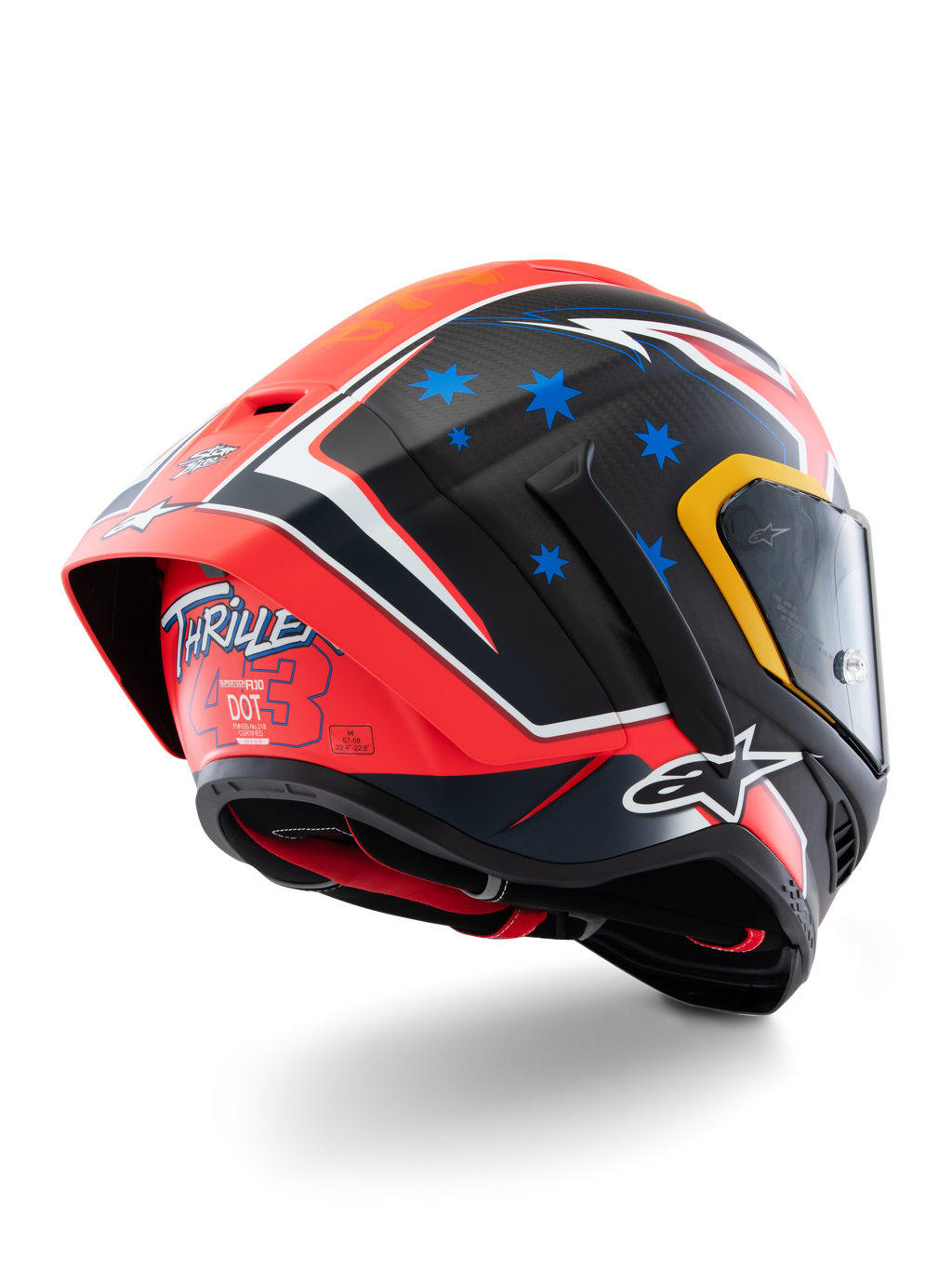 Casco Alpinestars Supertech R10 Miller Limited Edition, casco integrale da corsa, Carbon Red Matt con stelle blu e accenti bianchi, grafica 'Thriller 43' sul retro, grande spoiler aerodinamico, costruzione in fibra di carbonio
