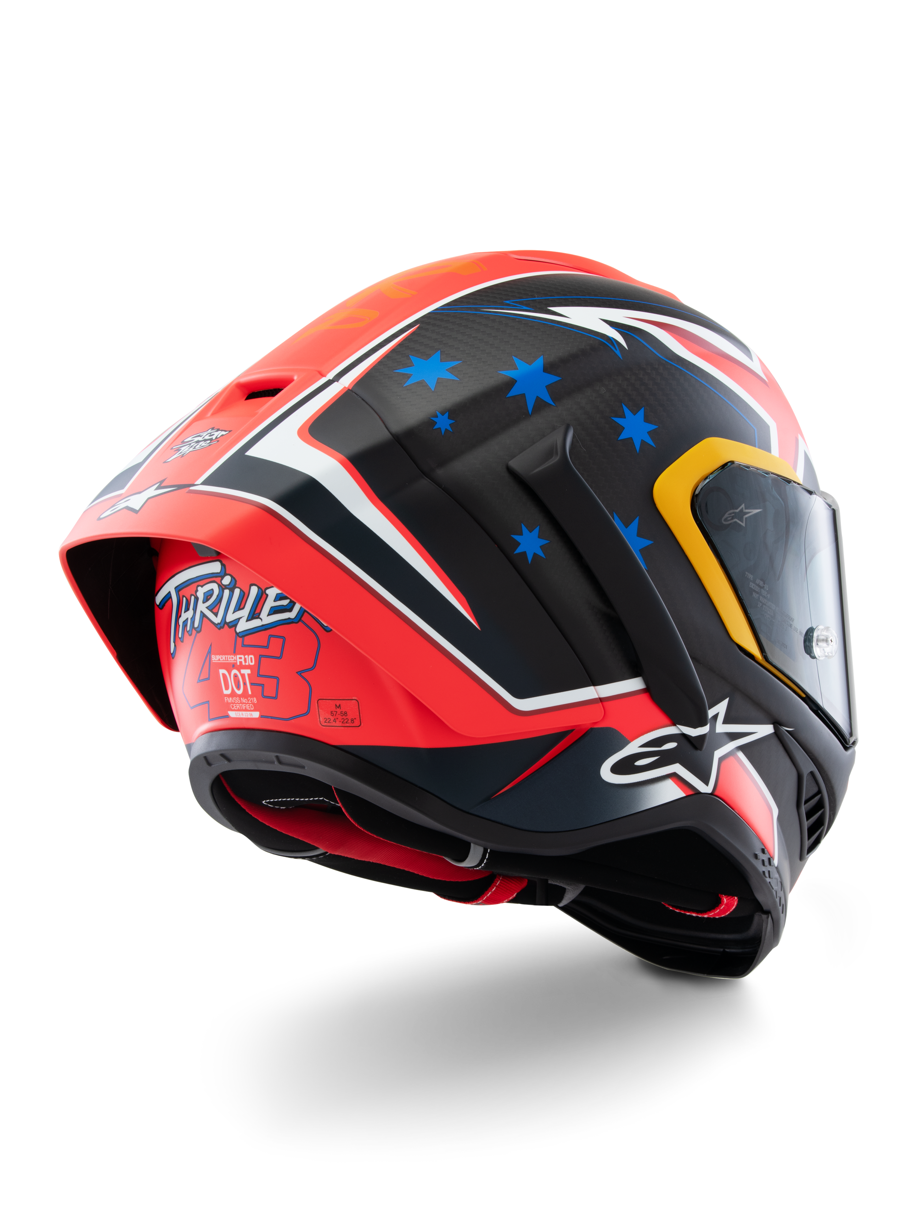 Casco Alpinestars Supertech R10 Miller Limited Edition, casco integrale da corsa, Carbon Red Matt con stelle blu e accenti bianchi, grafica 'Thriller 43' sul retro, grande spoiler aerodinamico, costruzione in fibra di carbonio