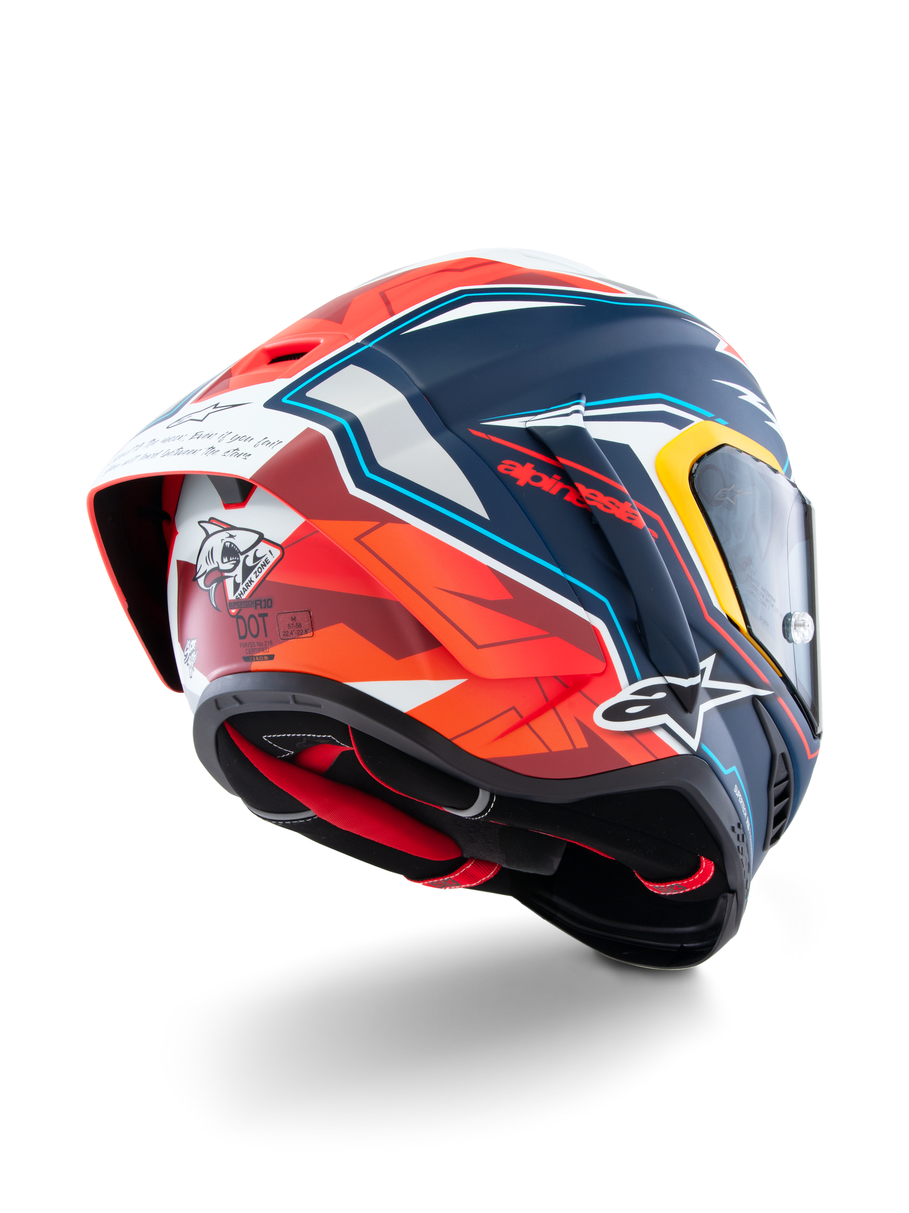 Casco Alpinestars Supertech R10 Acosta Limited Edition, vista posteriore di tre quarti, finitura opaca blu, rossa e bianca, con spoiler aerodinamico, grafica a squalo sul retro, loghi Alpinestars e certificazione DOT, casco da moto racing ad alte prestazioni