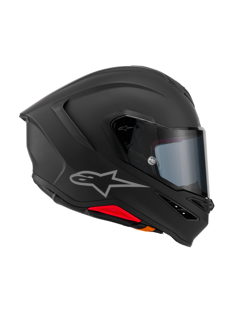 Alpinestars S-R7 Solid Helmet, casco integrale da moto, Nero Opaco, vista laterale di profilo che mostra la calotta aerodinamica in composito di carbonio, spoiler posteriore integrato, logo Astars argento, visiera trasparente e prese di ventilazione, equipaggiamento da competizione e guida sportiva
