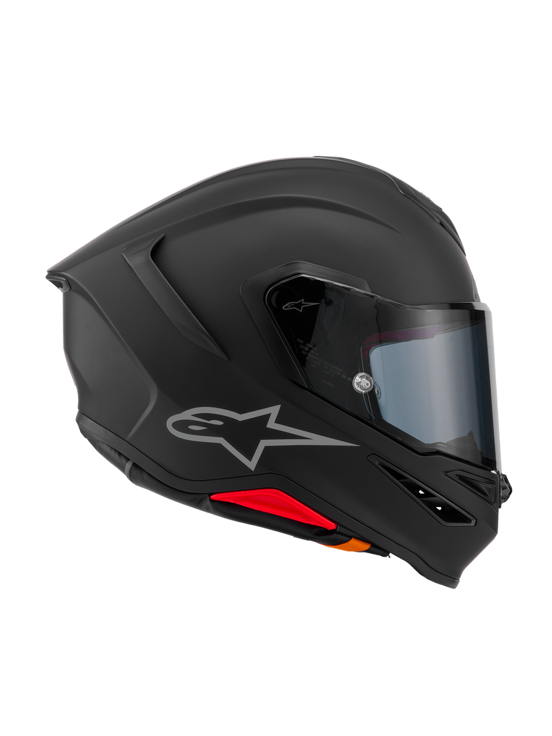 Alpinestars Casco S-R7 Solid ECE 22.06, casco integrale da moto, nero opaco, vista laterale di profilo che mostra la calotta aerodinamica, spoiler posteriore integrato, logo Alpinestars argento, visiera trasparente e prese di ventilazione, equipaggiamento da competizione e guida sportiva