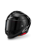 Alpinestars S-R7 Solid Helmet, nero lucido, casco integrale da moto con calotta in composito di carbonio, loghi a stella bianchi sulla fronte e sul lato, design aerodinamico con spoiler integrato e prese di ventilazione