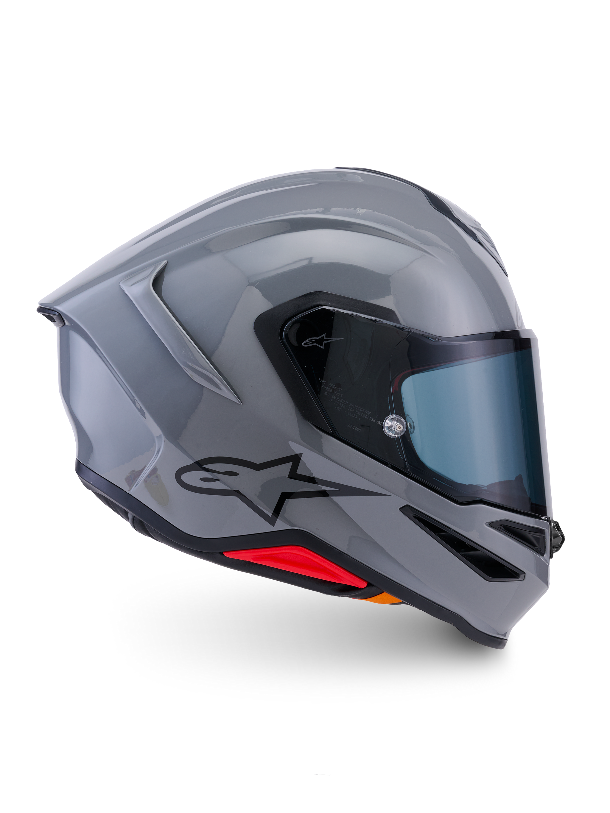 Casco Alpinestars S-R7 Solid, casco moto integrale, grigio lucido, vista laterale di profilo, calotta aerodinamica grigio lucido con logo nero e accenti rossi alla base, equipaggiamento per guida sportiva e corse ad alte prestazioni