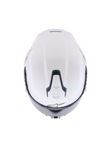 Casco Alpinestars S-R7 Solid, casco integrale da moto bianco lucido, vista dall'alto che mostra la calotta aerodinamica, presa di ventilazione superiore scorrevole con accenti neri e l'iconico logo a stella, design elegante di ispirazione racing per la stabilità ad alta velocità.