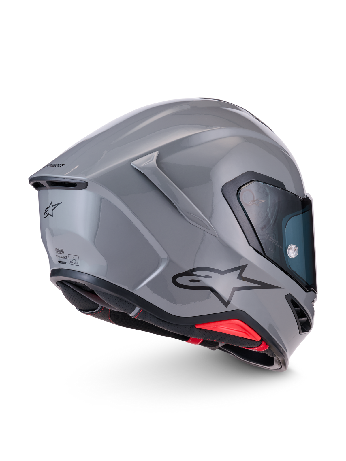 Alpinestars S-R7 Solid Casco ECE06/DOT, casco integrale da moto in grigio lucido con spoiler posteriore aerodinamico e logo Alpinestars laterale, vista laterale e posteriore
