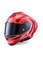 Casco Alpinestars Supertech R10 Arius, casco integrale racing, rosso e arancione lucido, con loghi Alpinestars bianchi, visiera fumé scura, design aerodinamico in composito di carbonio con sistema di ventilazione multiplo