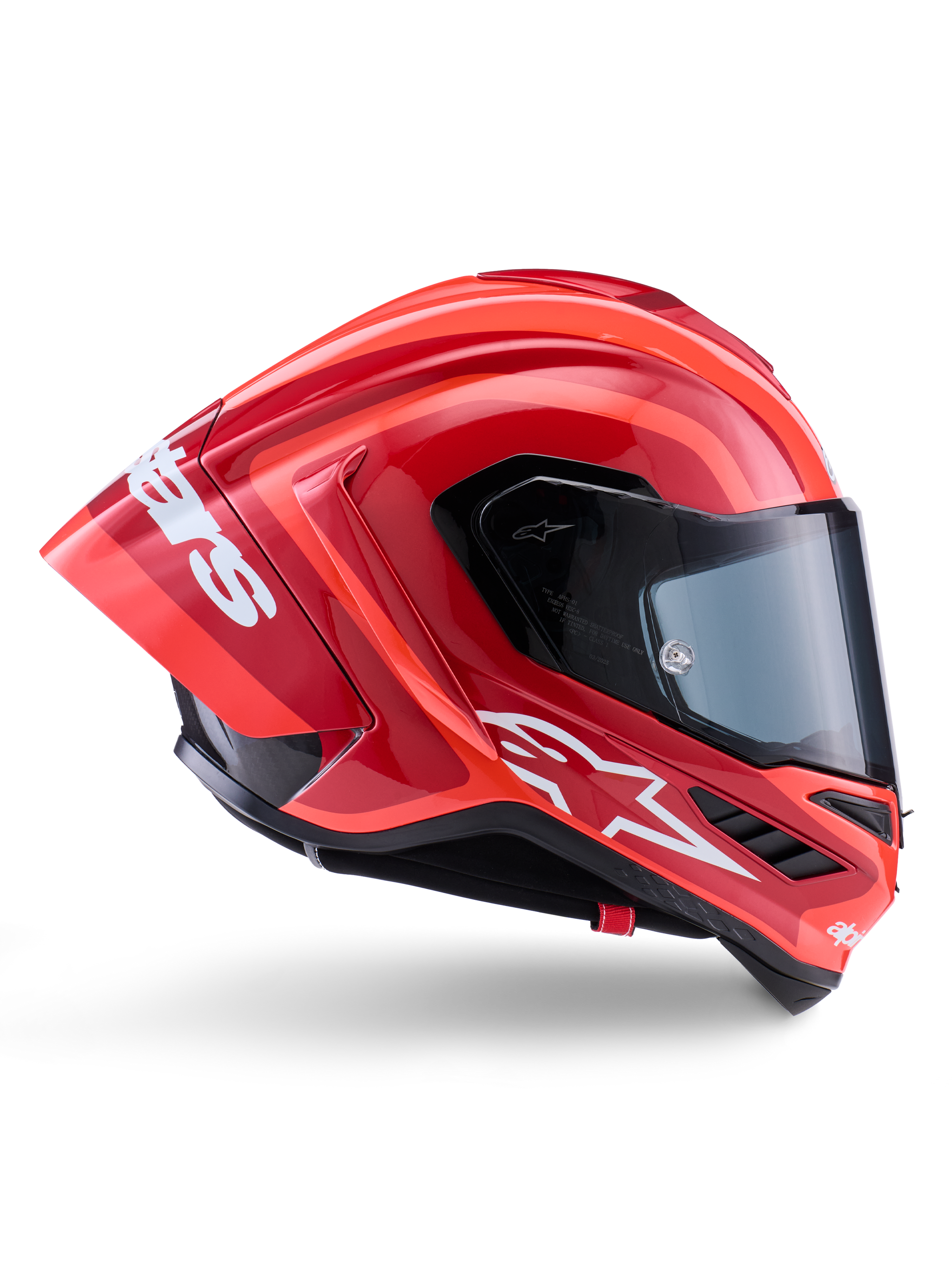 Casco Alpinestars Supertech R10 Arius, casco integrale racing, rosso e arancione lucido, vista laterale con spoiler posteriore aerodinamico, logo Astars bianco sulla mentoniera e visiera trasparente, progettato per prestazioni in pista ad alta velocità