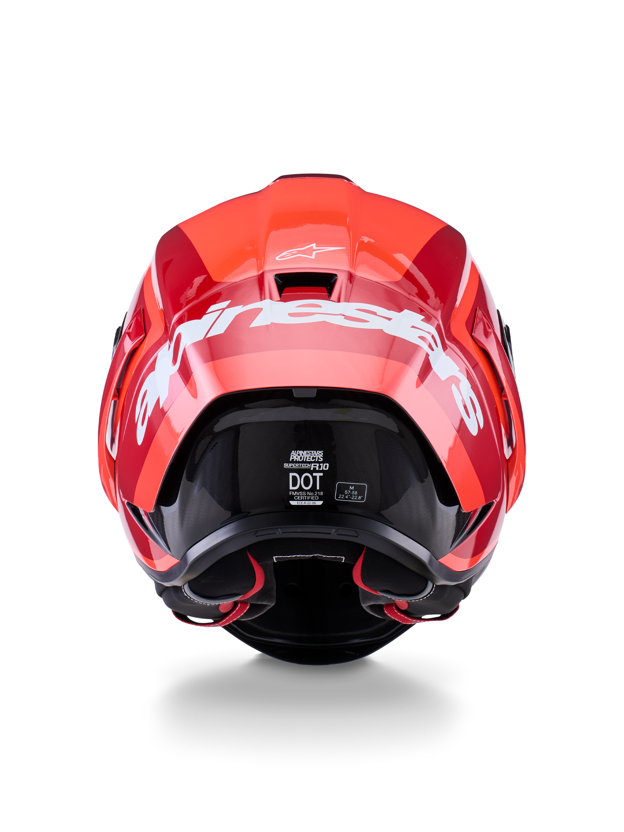 Casco Alpinestars Supertech R10 Arius, vista posteriore, design rosso lucido e rosso scuro, grande scritta Alpinestars bianca sul retro, etichette di certificazione DOT ed ECE visibili, casco da corsa aerodinamico ad alte prestazioni