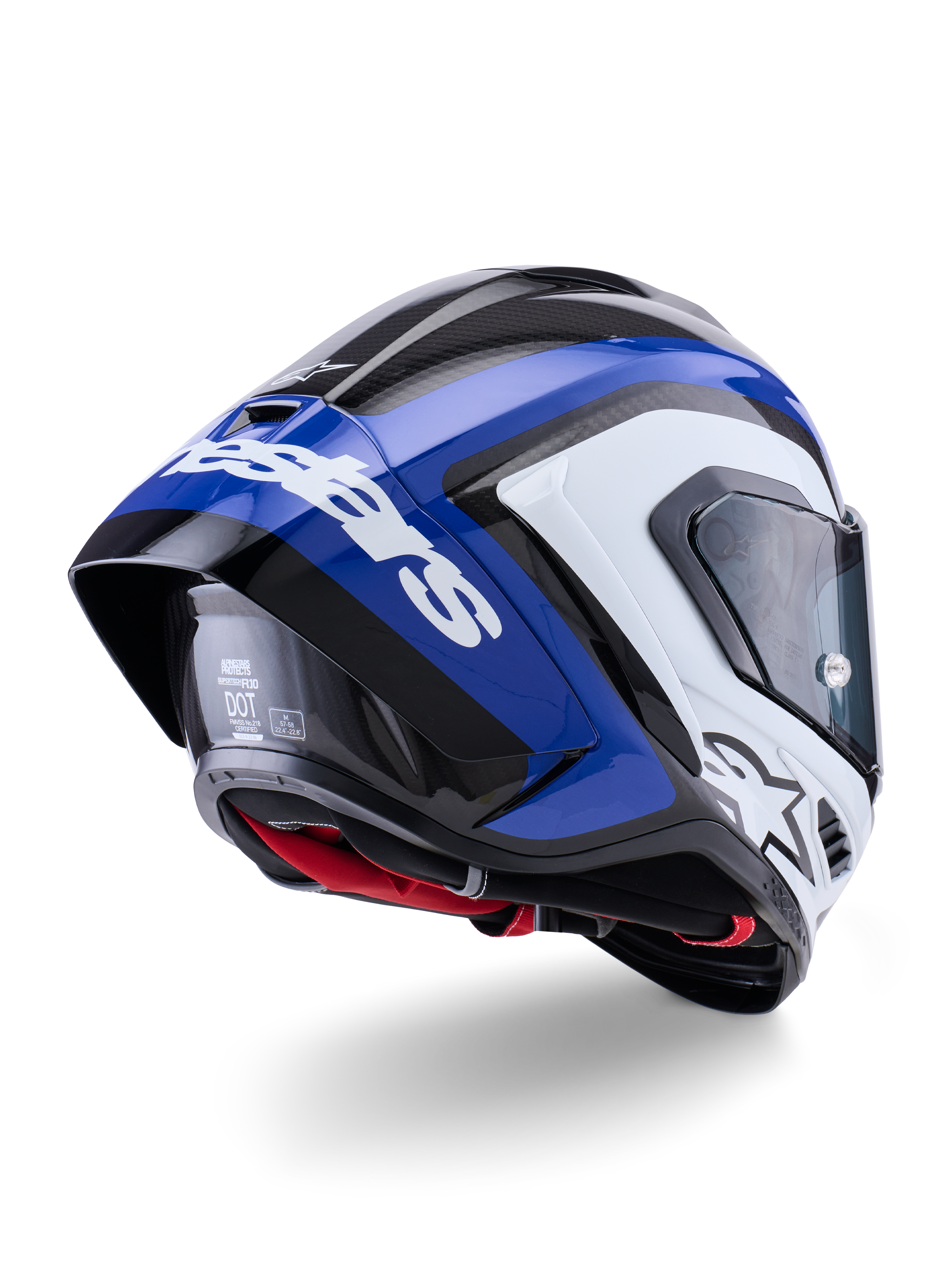 Casco Alpinestars Supertech R10 Arius, casco integrale da corsa, nero, bianco e blu lucido, vista di tre quarti posteriore che mostra lo spoiler aerodinamico, trama in fibra di carbonio a vista e marchio Alpinestars bianco in evidenza