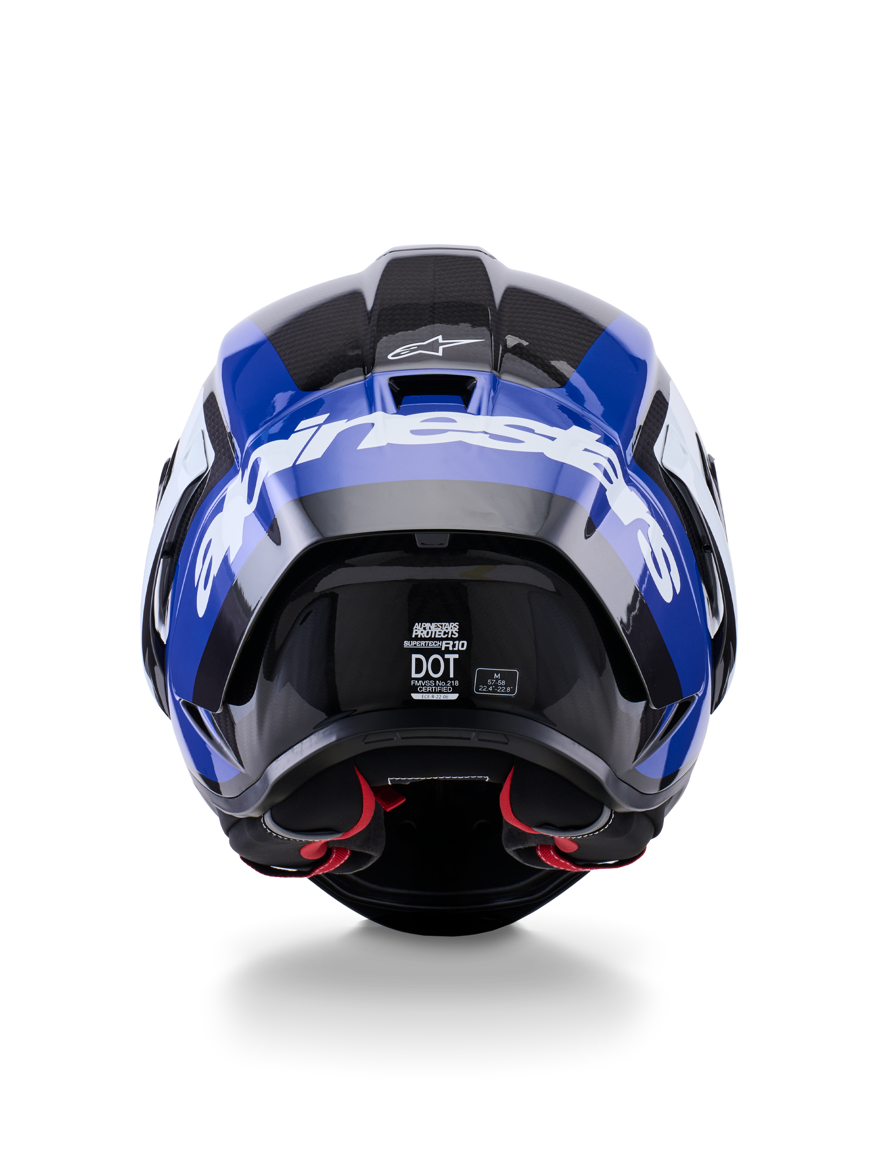 Casco Alpinestars Supertech R10 Arius, vista posteriore, nero, bianco e blu lucido, costruzione in fibra di carbonio con logo bianco evidente, forma aerodinamica, etichetta di certificazione DOT, imbottitura interna rossa