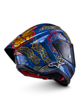 Casco Alpinestars Supertech R10 Martinator Thai, blu lucido con motivi mandala dorati e spoiler posteriore.