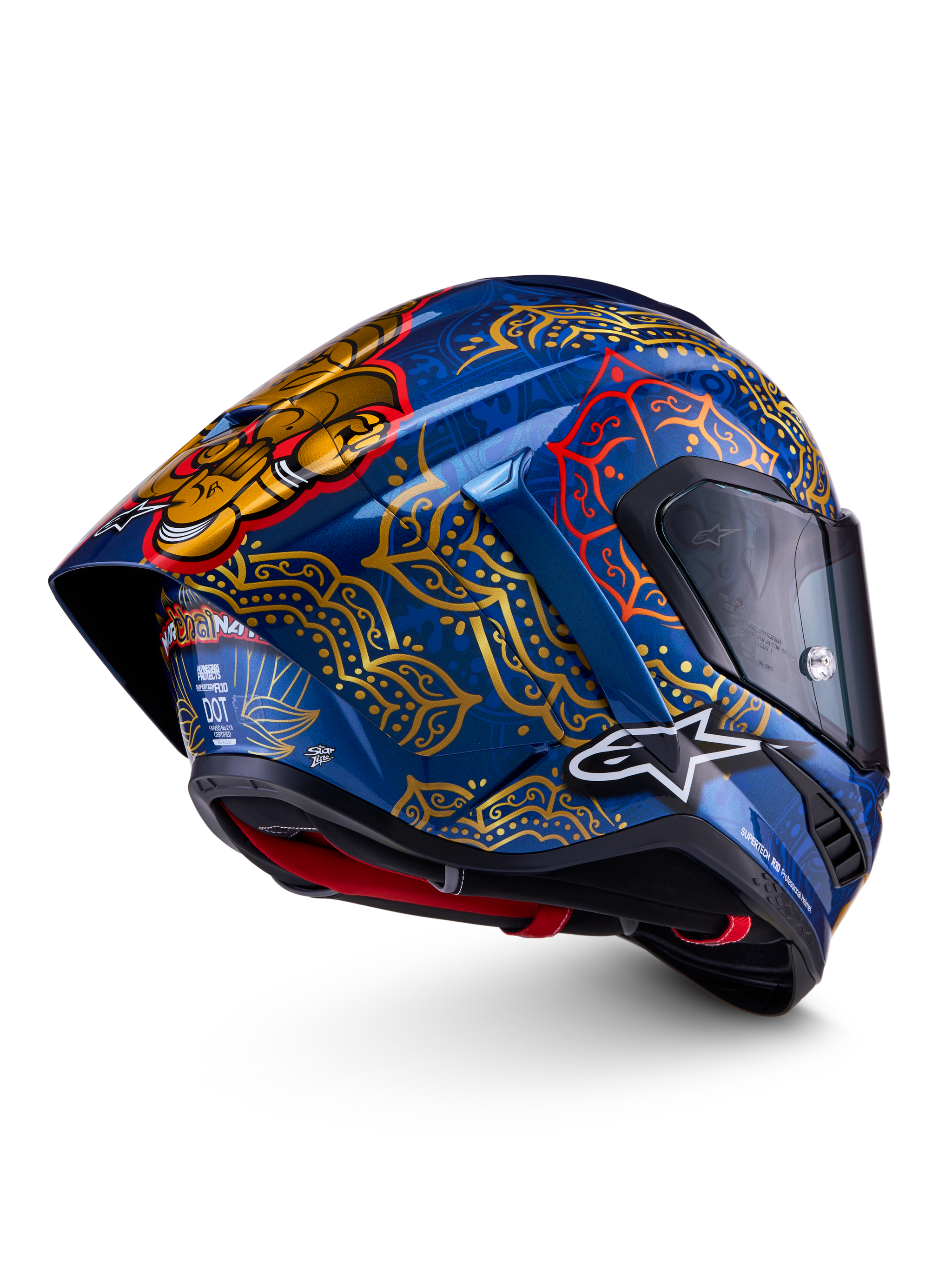 Casco Alpinestars Supertech R10 Martinator Thai, blu lucido con motivi mandala dorati e spoiler posteriore.