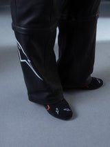 Alpinestars RSRV Starline Shoes, scarpe lifestyle premium, nere con dettagli bianchi e rossi, design elegante con texture liscia
