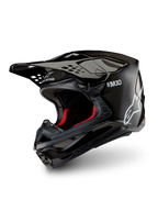 Alpinestars Supertech M10 Solid ECE 22.06, casco da motocross nero lucido in carbonio, con visiera a frontino, interno rosso e omologazione ECE 22.06, vista a tre quarti