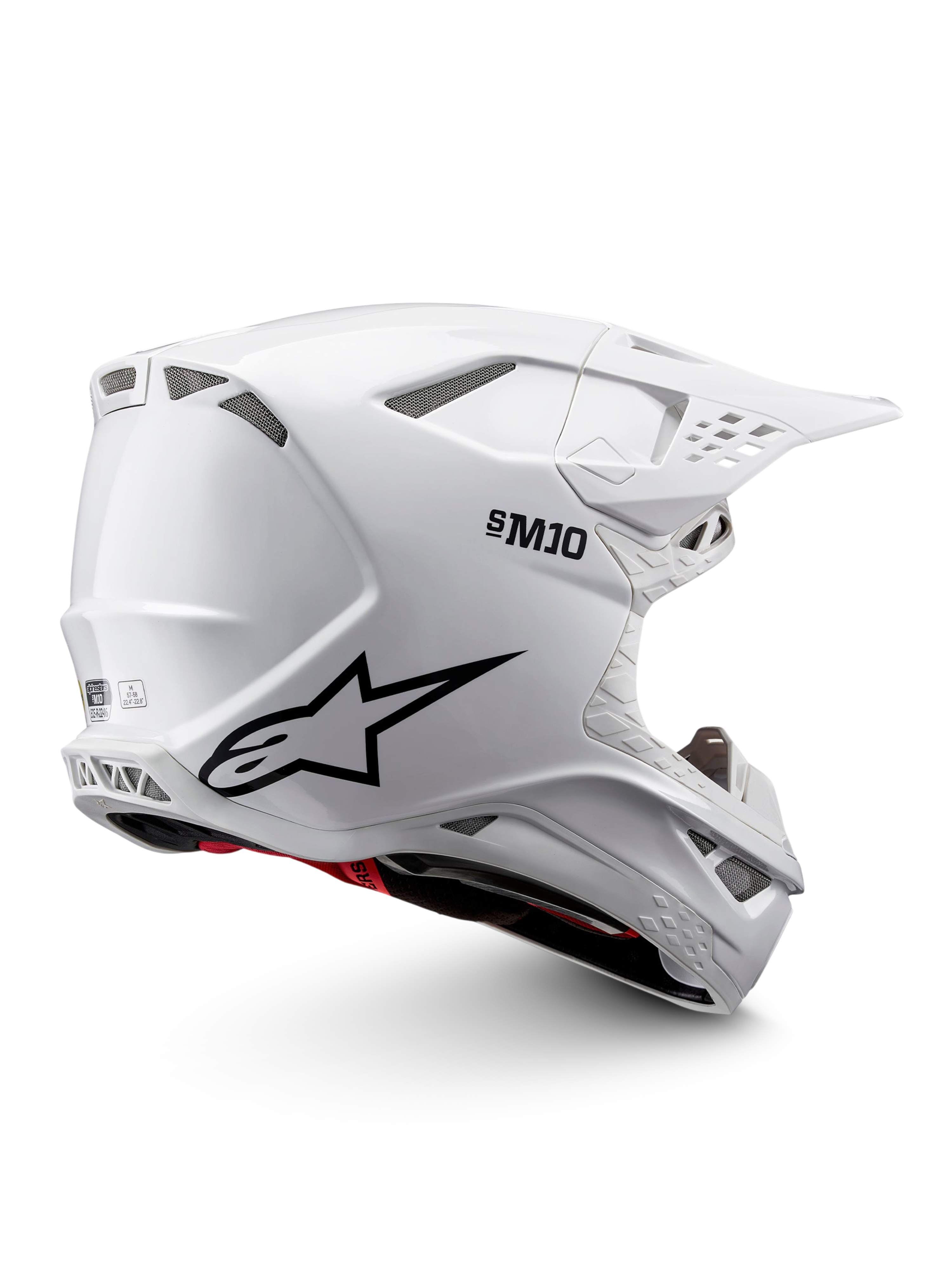 Alpinestars Casco Supertech M10 Solid ECE 22.06, casco da motocross bianco lucido con grafiche nere, dettagli rossi, prese d’aria e visiera parasole