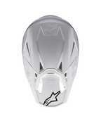 Alpinestars Supertech M10 Solid ECE 22.06, casco da motocross bianco lucido, vista posteriore con prese d’aria e loghi Alpinestars neri, calotta composita in carbonio e aramide