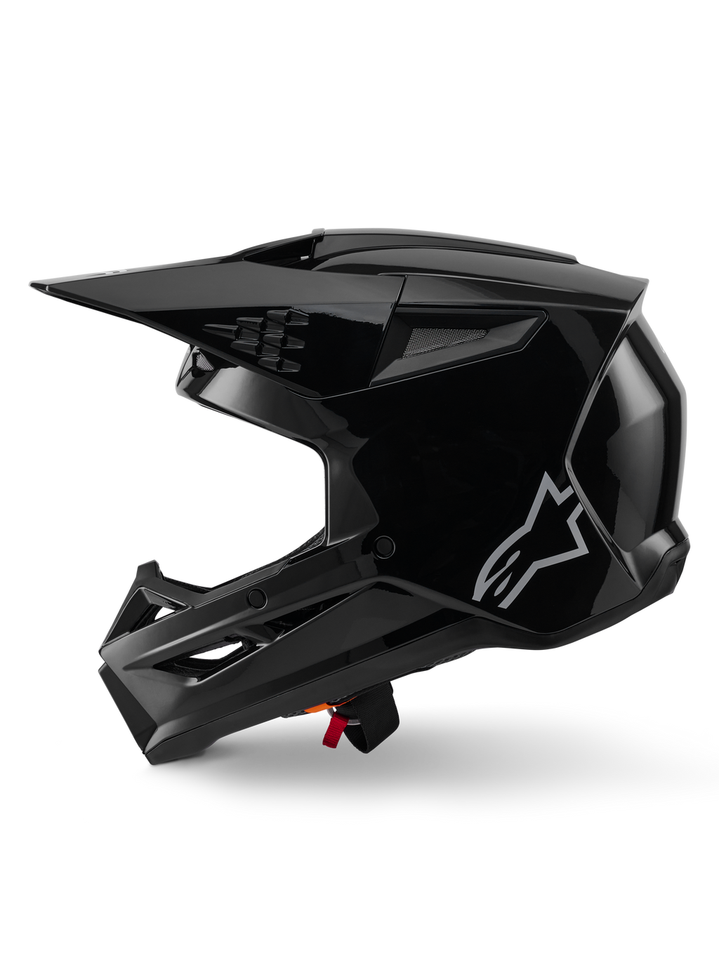 Casco Alpinestars S-M3 Solid, casco da motocross, nero lucido, vista laterale, logo Alpinestars argento, visiera aerodinamica e diverse prese d'aria per corse off-road