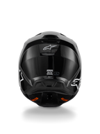Casco Alpinestars S-M3 Solid, casco da motocross, finitura nero lucido, vista posteriore con logo Alpinestars bianco, etichetta di certificazione ECE 22.06 e calotta aerodinamica con estrattori d'aria