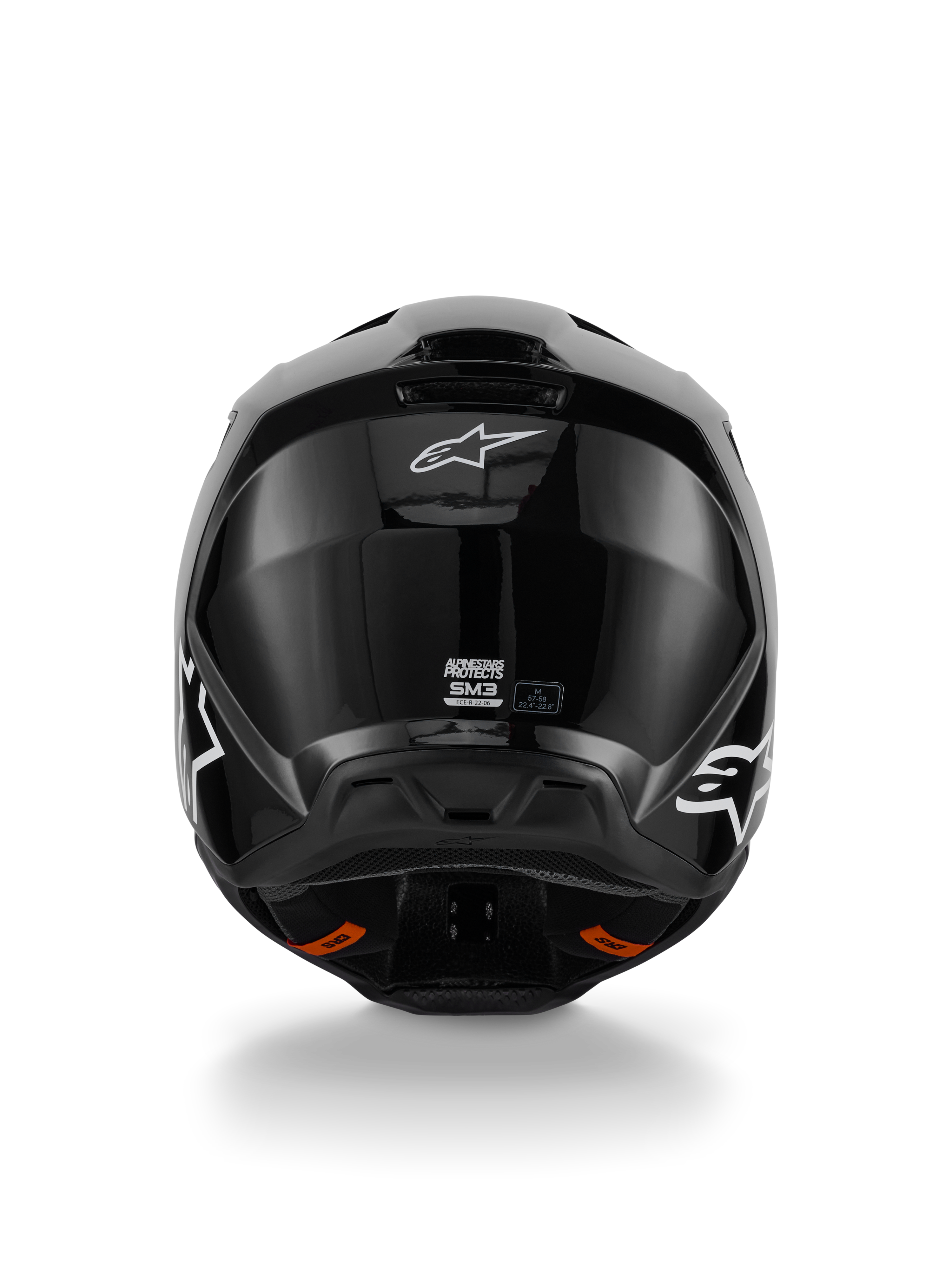 Casco Alpinestars S-M3 Solid, casco da motocross, finitura nero lucido, vista posteriore con logo Alpinestars bianco, etichetta di certificazione ECE 22.06 e calotta aerodinamica con estrattori d'aria