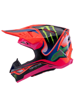 Alpinestars Supertech M10 Deegan Monster Helmet, casco da motocross, arancione fluo, rosa e nero con accenti blu, vista laterale con grafiche dell'artiglio Monster Energy e logo Alpinestars, design aerodinamico avanzato per gare off-road
