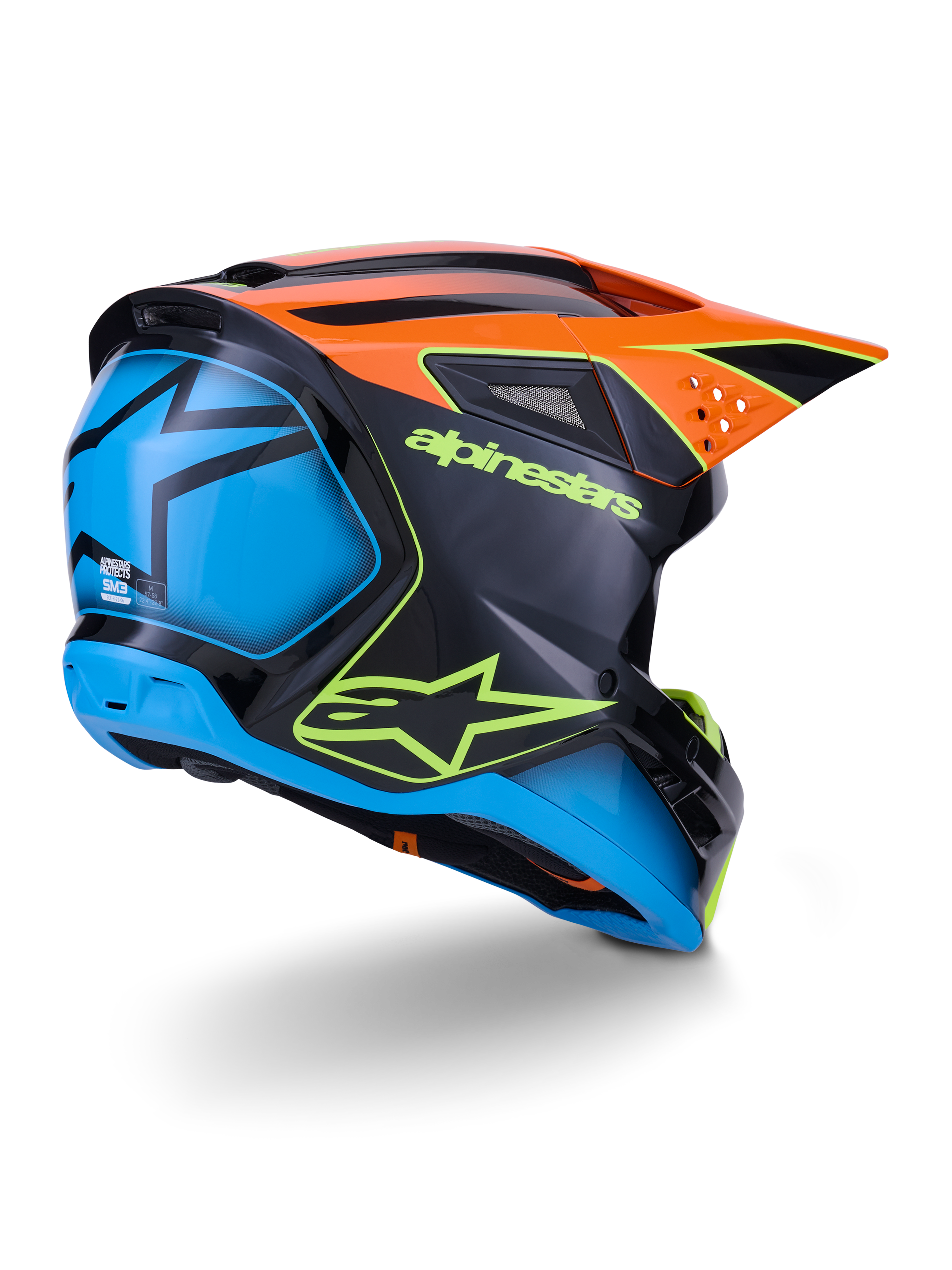 Casco Alpinestars S-M3 Fray ECE 22.06, casco da motocross, nero con pannelli arancioni e blu, logo Alpinestars giallo neon, ampia sezione posteriore blu con grafica a stella, visiera arancione con prese d'aria integrate, attrezzatura protettiva professionale per fuoristrada