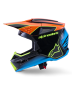 Alpinestars S-M3 Fray Helmet ECE 22.06, casco da motocross, nero con accenti arancioni, blu e giallo fluorescente, vista laterale di profilo che mostra la calotta aerodinamica e le prese d'aria integrate, con logo Alpinestars in evidenza, protezione professionale per corse off-road