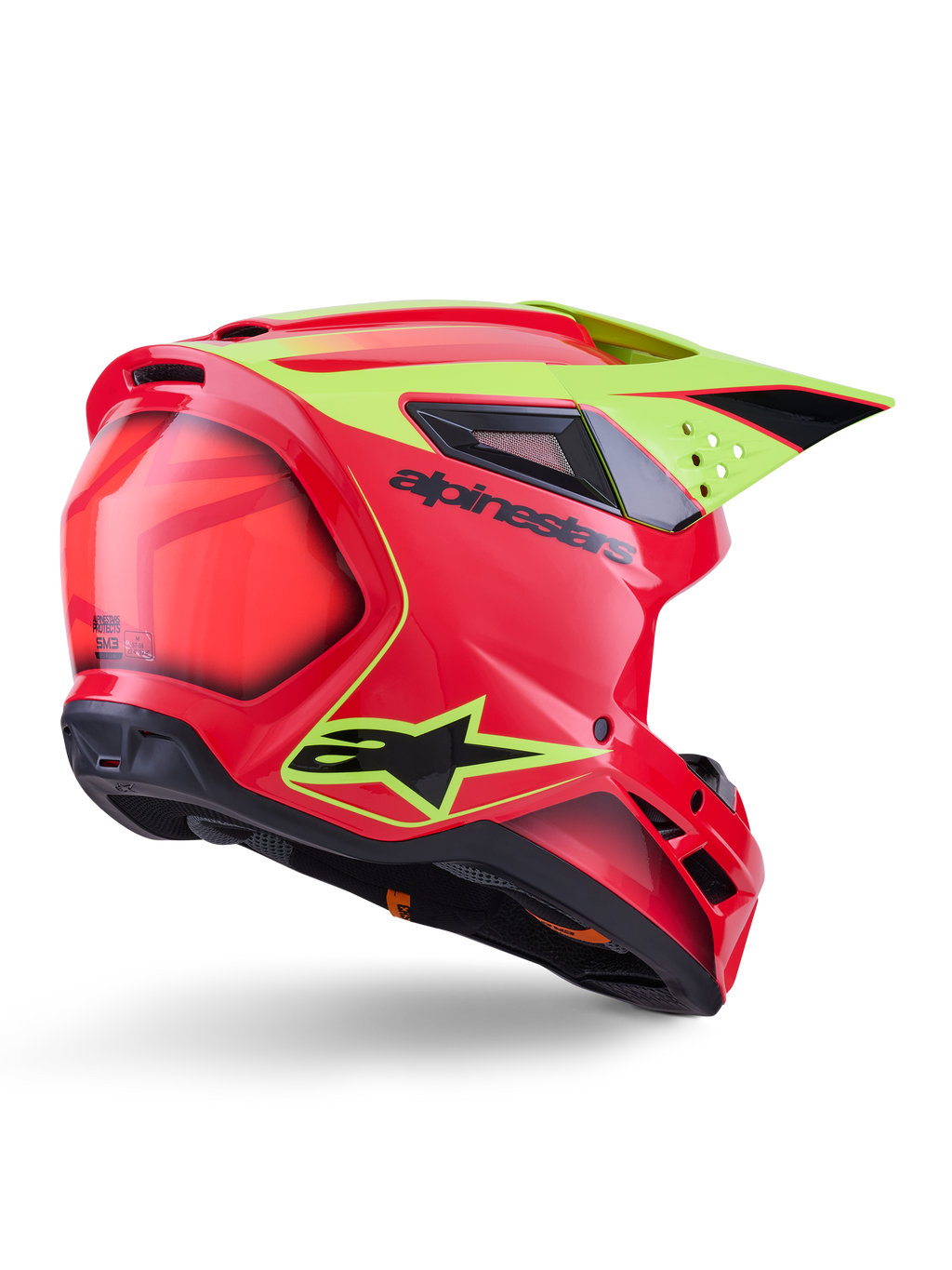 Casco Alpinestars S-M3 Fray ECE 22.06, casco da motocross, rosso giallo fluo nero lucido, vista posteriore di tre quarti che mostra la calotta aerodinamica snella con molteplici prese d'aria, grafiche giallo neon e il logo Alpinestars nero in evidenza.