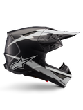 Casco Alpinestars Supertech M10 Ampress, casco da motocross, nero e bianco opaco, profilo aerodinamico con grafiche a fulmine bianco, prese d'aria multiple, visiera parasole estesa, costruzione in fibra di carbonio con finitura opaca