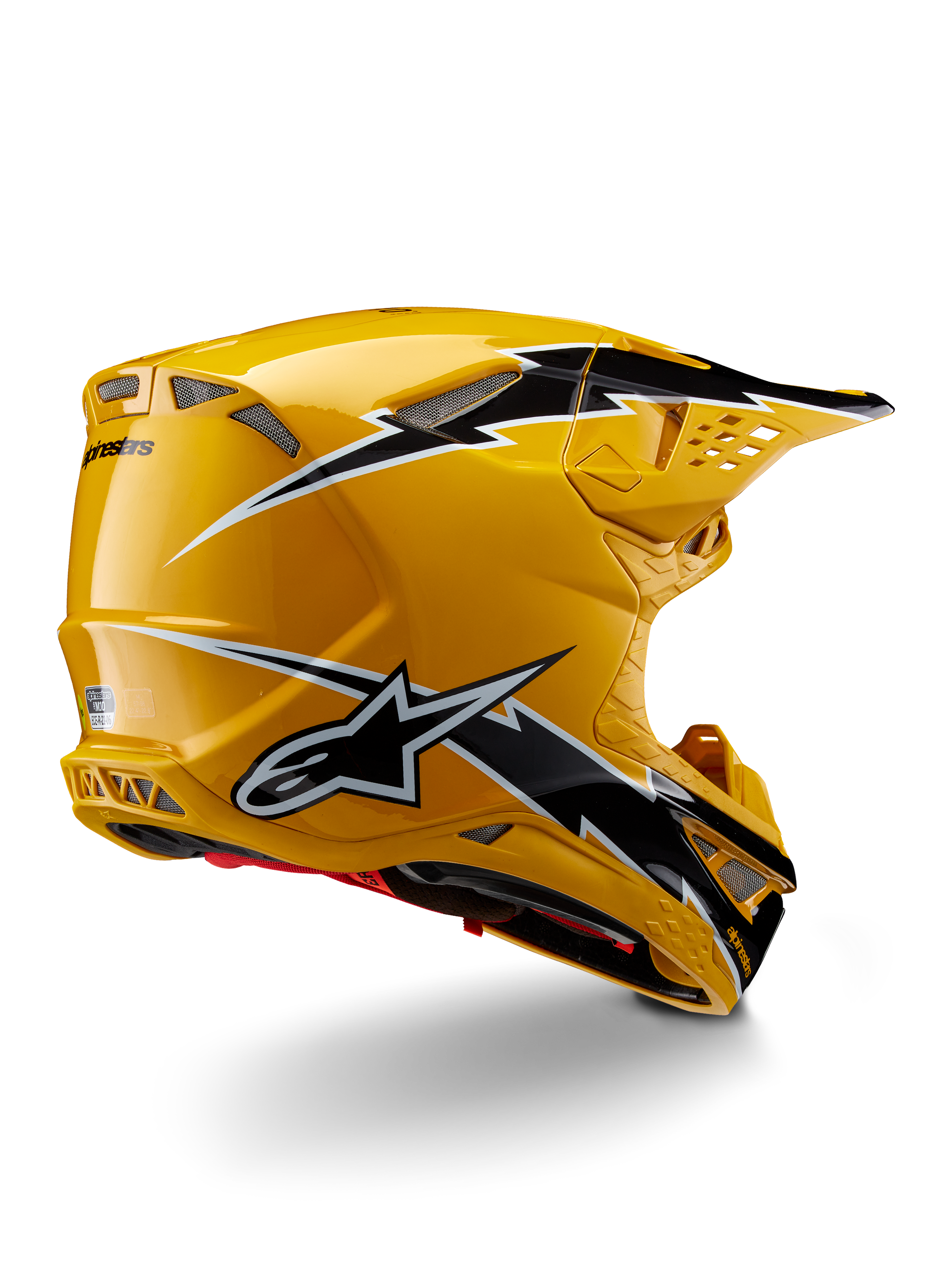 Casco Alpinestars Supertech M10 Ampress, casco da motocross, Nero Giallo Lucido, caratterizzato da una finitura gialla lucida con grafiche stile fulmine nere e bianche, vista posteriore di tre quarti che mostra la calotta aerodinamica e le prese d'aria integrate.