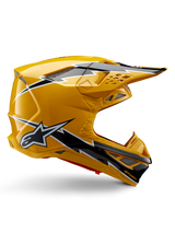 Casco Alpinestars Supertech M10 Ampress, casco da motocross, nero e giallo lucido, profilo laterale con grafiche a fulmine nere e bianche, logo a stella Alpinestars, design aerodinamico con porte di ventilazione integrate e visiera regolabile