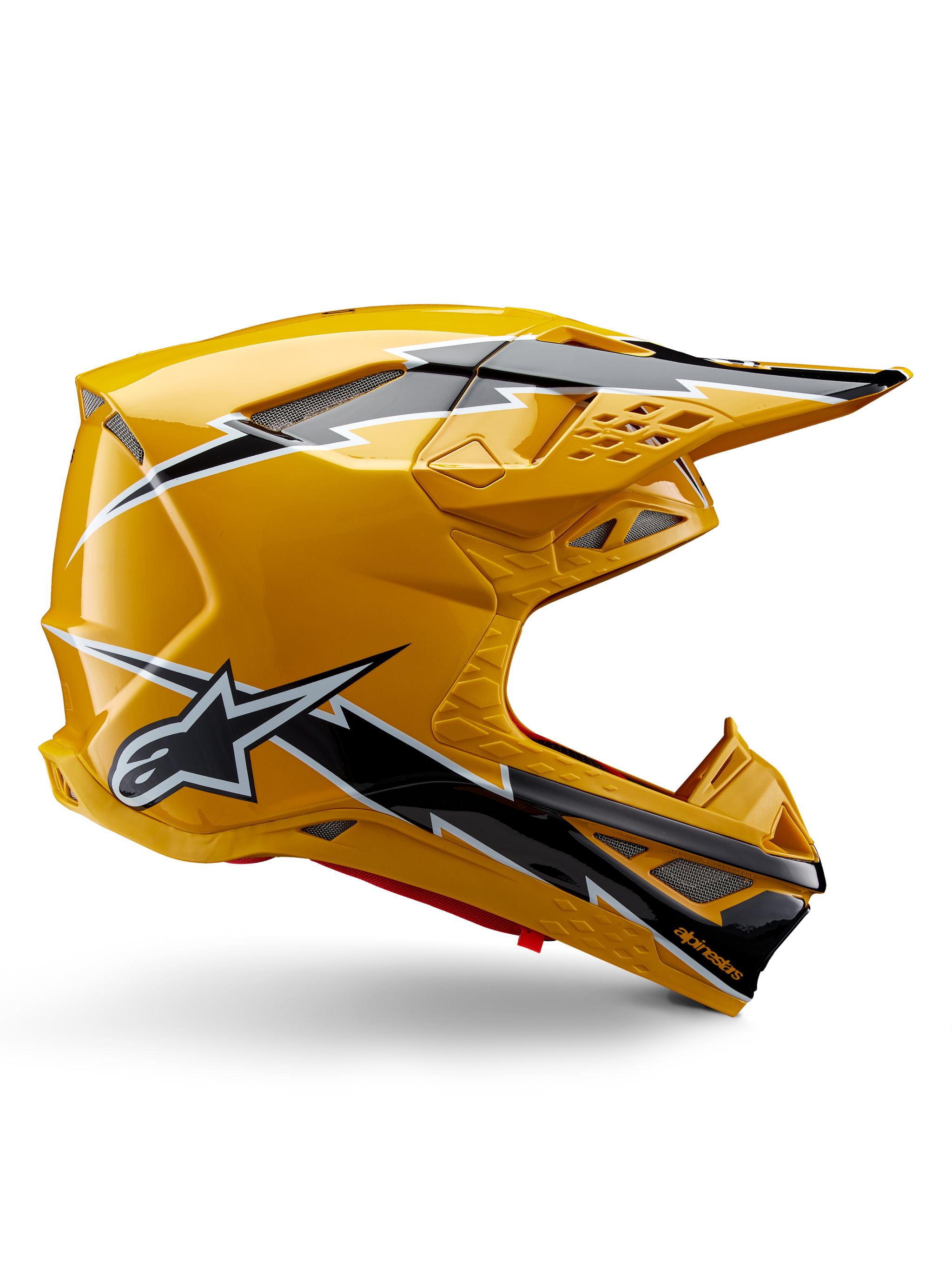 Casco Alpinestars Supertech M10 Ampress, casco da motocross, nero e giallo lucido, profilo laterale con grafiche a fulmine nere e bianche, logo a stella Alpinestars, design aerodinamico con porte di ventilazione integrate e visiera regolabile