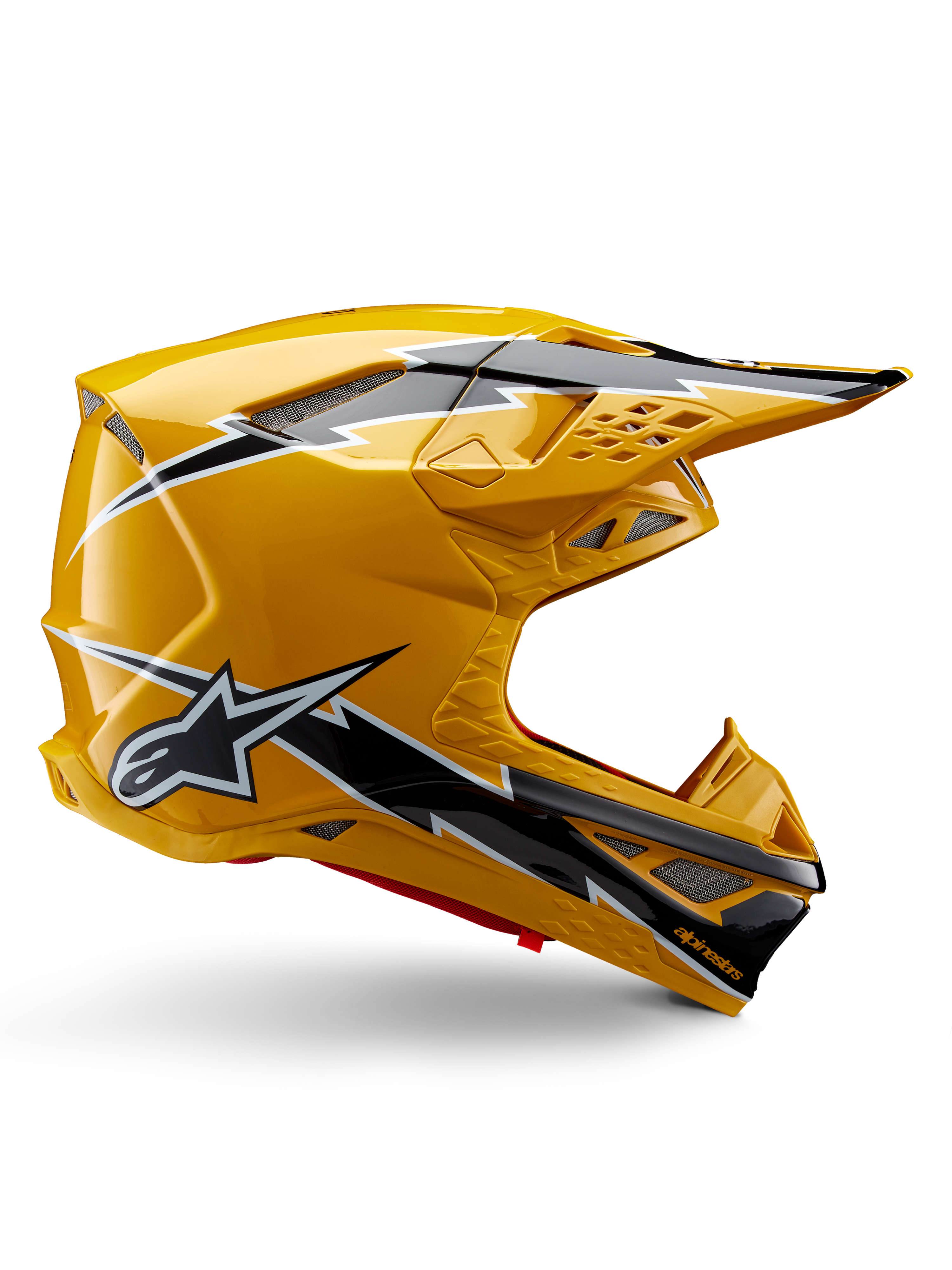 Casco Alpinestars Supertech M10 Ampress, casco da motocross, nero e giallo lucido, profilo laterale con grafiche a fulmine nere e bianche, logo a stella Alpinestars, design aerodinamico con porte di ventilazione integrate e visiera regolabile
