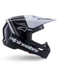 Casco Alpinestars S-M3 Radium, casco da motocross off-road, nero, bianco e grigio lucido, design aerodinamico angolare con prese d'aria, vista laterale, finitura lucida con strisce grigie e visiera bianca con logo Alpinestars