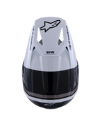 Casco Alpinestars S-M3 Radium, casco da motocross, nero, bianco e grigio lucido, vista dall'alto che mostra la visiera bianca con logo Astar nero e marchio SM3, finitura lucida con prese d'aria, protezione per la testa off-road ad alte prestazioni