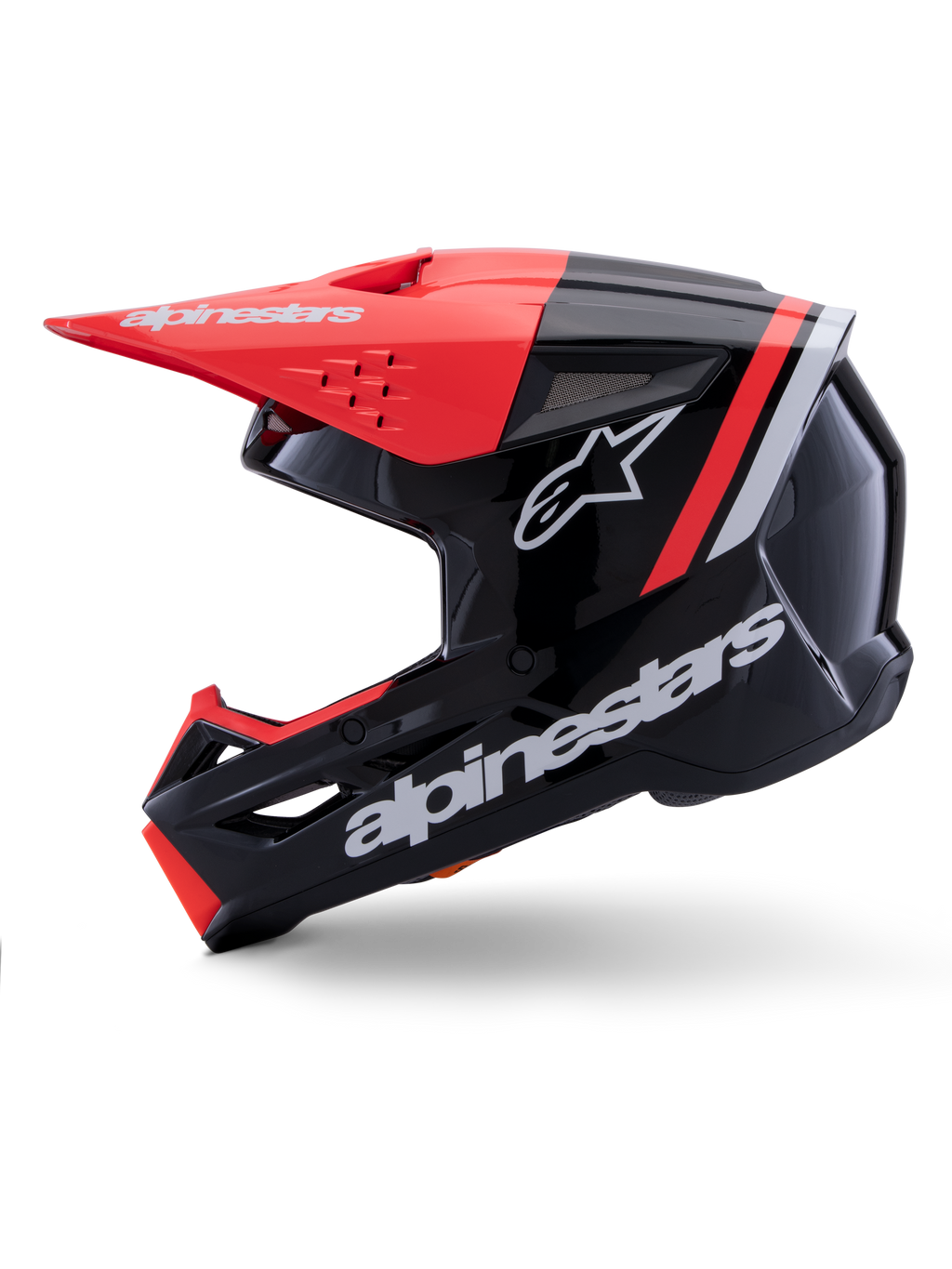 Casco Alpinestars S-M3 Radium, casco da motocross, nero, rosso fluo e bianco lucido, vista di profilo, con grande marchio Alpinestars bianco e logo a stella, frontino rosso fluo e dettagli sulla mentoniera, finitura lucida, progettato per la guida fuoristrada MX ed Enduro