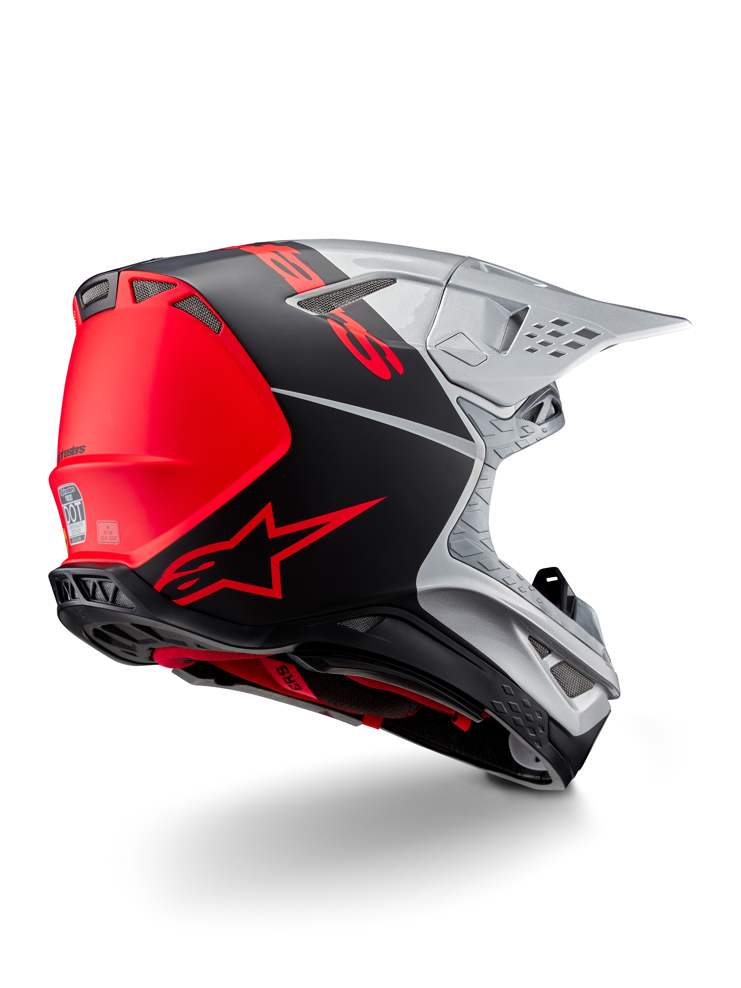 Casco Alpinestars Supertech M10 Flood ECE 22.06, casco da motocross, argento, nero e arancione fluo, vista laterale posteriore che evidenzia il design aerodinamico della calotta, le prese di ventilazione e la finitura opaca-lucida