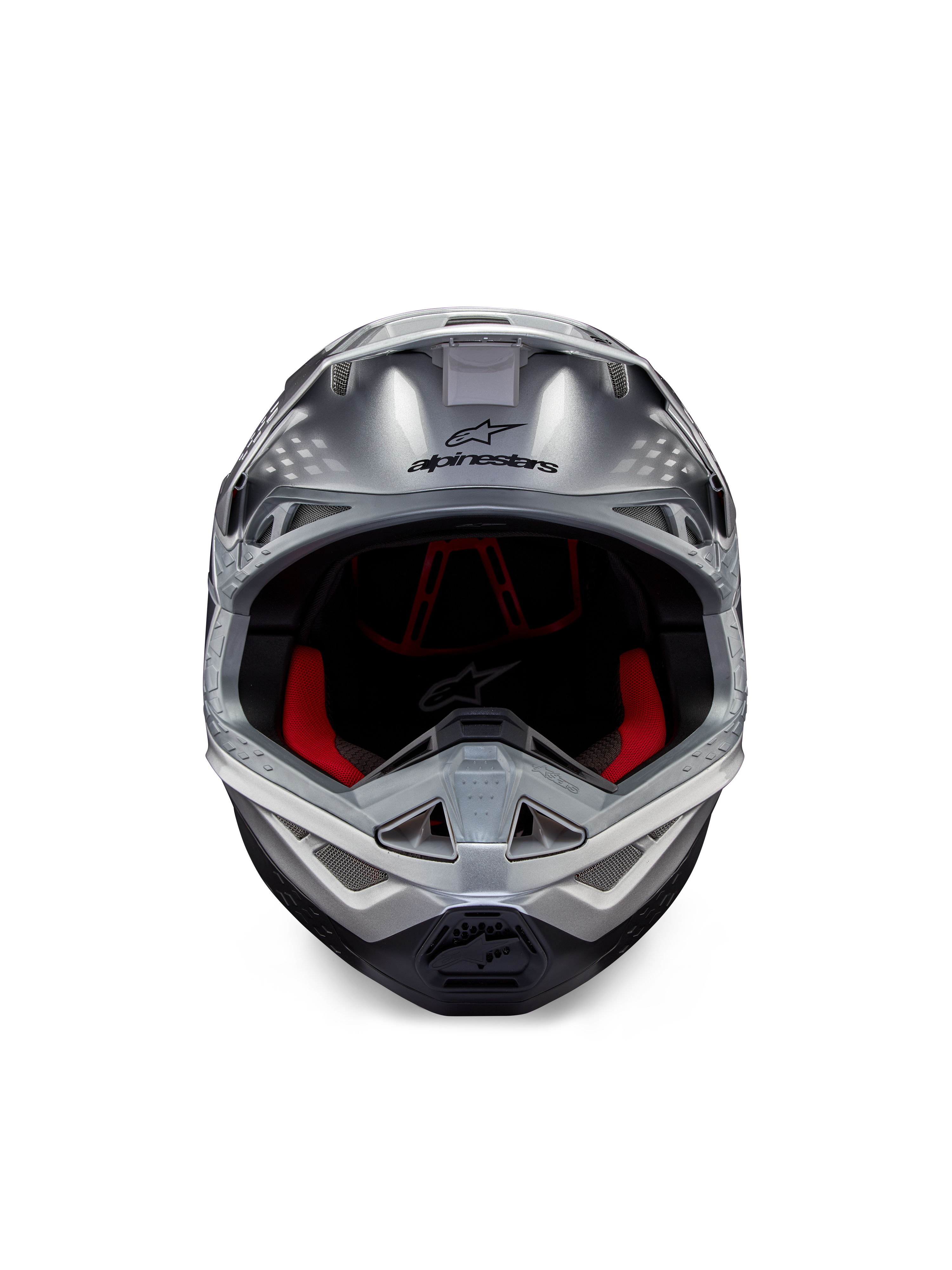 Casco Alpinestars Supertech M10 Flood ECE 22.06, casco da motocross, argento, nero e arancione fluo, vista frontale con calotta aerodinamica, ampia apertura per la maschera con imbottitura interna rossa, logo Alpinestars nero e mentoniera ventilata per gare fuoristrada