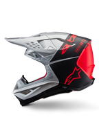 Casco Alpinestars Supertech M10 Flood, casco da motocross, argento e nero con accenti arancione fluo, profilo laterale, design aerodinamico con prese d'aria, finitura opaca e lucida, protezione professionale per gare off-road
