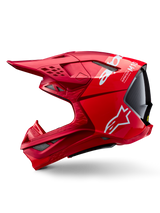 Casco Alpinestars Supertech M10 Flood ECE 22.06, casco da motocross, rosso e rosso fluo con finitura opaca e lucida, vista laterale che mostra il design aerodinamico della calotta, prese d'aria multiple e logo Alpinestars bianco