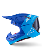Casco Alpinestars Supertech M10 Flood, casco da motocross, blu metallizzato e blu medio con carbonio nero, vista laterale di profilo che mostra finiture opache e lucide, logo Alpinestars bianco e branding Supertech M10, protezione avanzata per la testa per il fuoristrada
